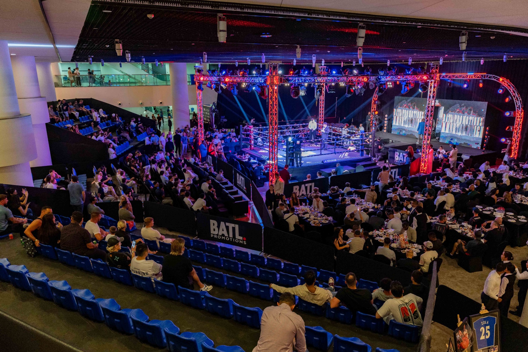 BATL boxing ring under spotlights